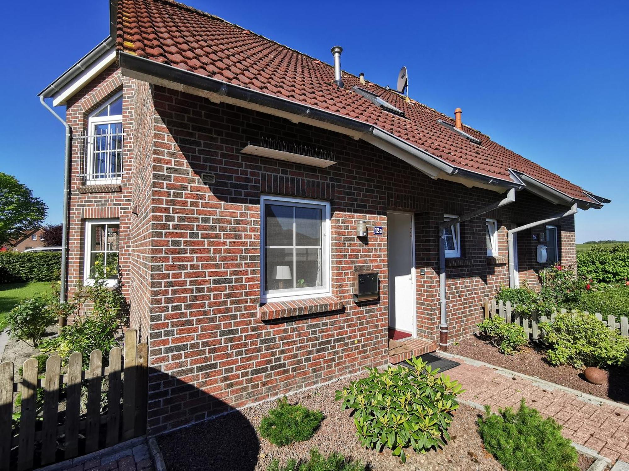 Villa Friesenhaus Duewels Hus Greetsiel Esterno foto